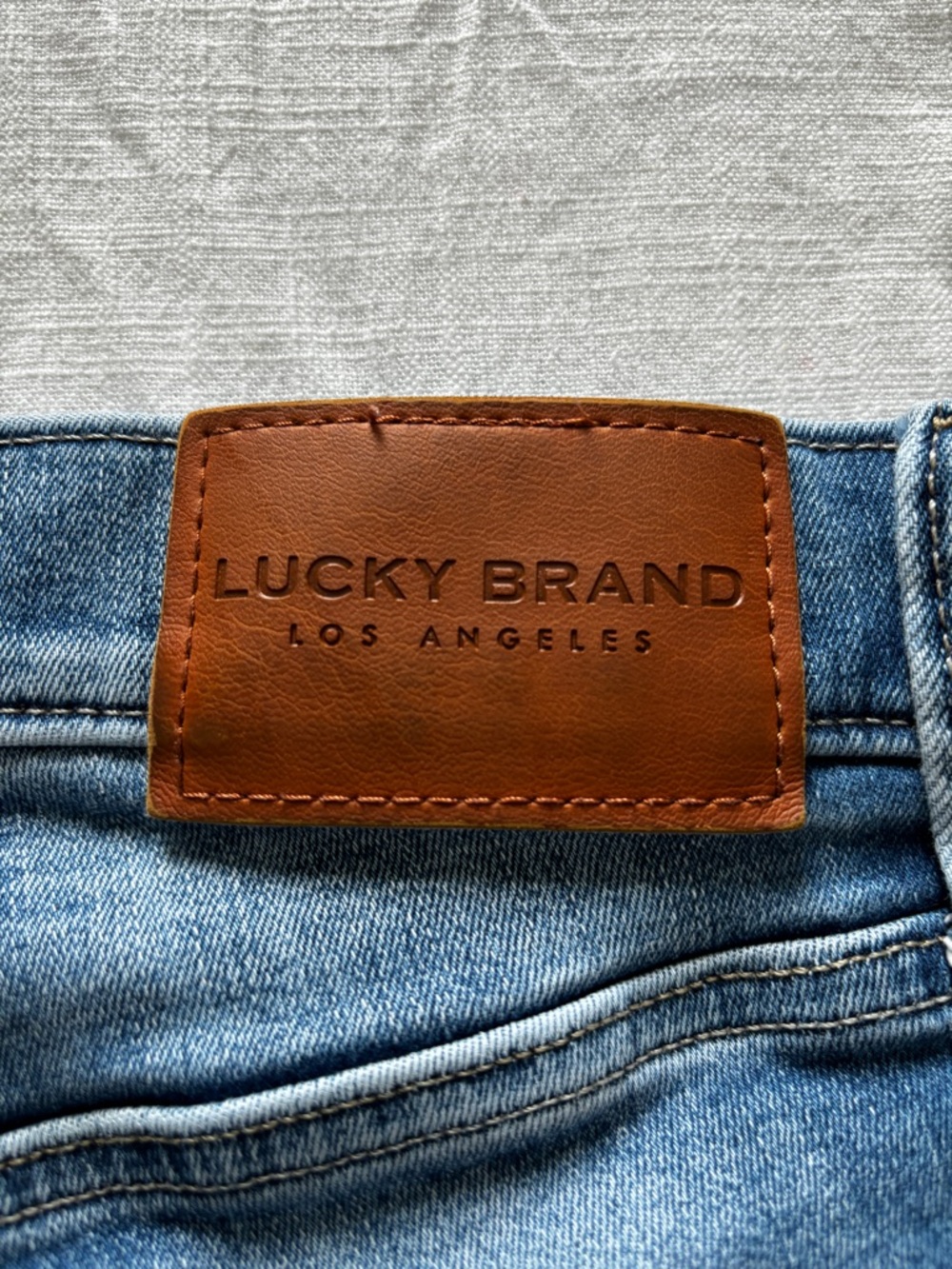 Lucky Brand Light Blue Denim Capri Jeans with Brown Leather Patch